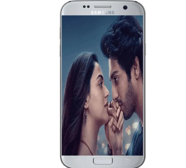 A person watching sariyraa movie on an Android smartphone with the Vedu app